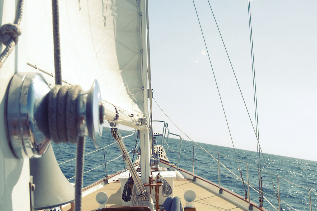 View from the cockpit of a sailboat underway